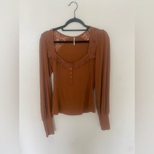 Free People, size Medium. Burnt Orange/Sienna renaissance top w/ lace details